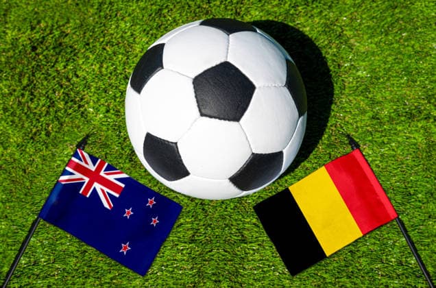 May 22, 2026: PHOTO MONTAGE, 2026 FIFA World Cup, WM, Weltmeisterschaft, Fussball National flags of New Zealand and Belgium with a soccer ball on the field. Stock image for the group stage match on June 27 at the 2026 FIFA World Cup *** FOTOMONTAGE, Fußball-Weltmeisterschaft 2026: Nationalflaggen von Neuseeland und Belgien mit Fußball auf Rasen. Symbolbild zum WM-Gruppenspiel am 27 Juni bei der FIFA Fussball-Weltmeisterschaft 2026