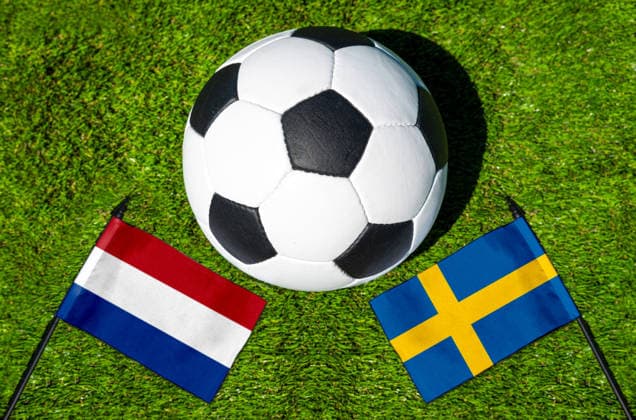 May 22, 2026: PHOTO MONTAGE, 2026 FIFA World Cup, WM, Weltmeisterschaft, Fussball National flags of the Netherlands and Sweden with a soccer ball on the field. Stock image for the group stage match on June 20 at the 2026 FIFA World Cup *** FOTOMONTAGE, Fußball-Weltmeisterschaft 2026: Nationalflaggen von Niederlande und Schweden mit Fußball auf Rasen. Symbolbild zum WM-Gruppenspiel am 20 Juni bei der FIFA Fussball-Weltmeisterschaft 2026