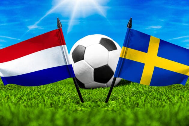 May 22, 2026: PHOTO MONTAGE, 2026 FIFA World Cup, WM, Weltmeisterschaft, Fussball National flags of the Netherlands and Sweden with a soccer ball on the field. Stock image for the group stage match on June 20 at the 2026 FIFA World Cup *** FOTOMONTAGE, Fußball-Weltmeisterschaft 2026: Nationalflaggen von Niederlande und Schweden mit Fußball auf Rasen. Symbolbild zum WM-Gruppenspiel am 20 Juni bei der FIFA Fussball-Weltmeisterschaft 2026