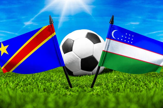 May 22, 2026: PHOTO MONTAGE, 2026 FIFA World Cup, WM, Weltmeisterschaft, Fussball National flags of Congo and Uzbekistan with a soccer ball on the field. Stock image for the group stage match on June 28 at the 2026 FIFA World Cup *** FOTOMONTAGE, Fußball-Weltmeisterschaft 2026: Nationalflaggen von Kongo und Usbekistan mit Fußball auf Rasen. Symbolbild zum WM-Gruppenspiel am 28 Juni bei der FIFA Fussball-Weltmeisterschaft 2026