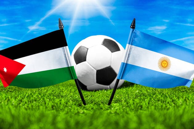 May 22, 2026: PHOTO MONTAGE, 2026 FIFA World Cup, WM, Weltmeisterschaft, Fussball National flags of Jordan and Argentina with a soccer ball on the field. Illustrative image for the group stage match on June 28 at the 2026 FIFA World Cup *** FOTOMONTAGE, Fußball-Weltmeisterschaft 2026: Nationalflaggen von Jordanien und Argentinien mit Fußball auf Rasen. Symbolbild zum WM-Gruppenspiel am 28 Juni bei der FIFA Fussball-Weltmeisterschaft 2026