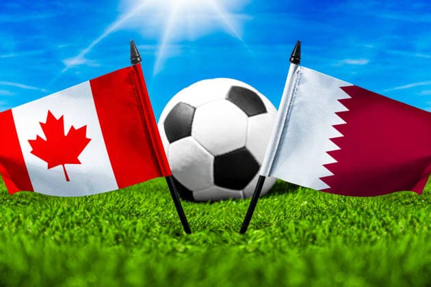 May 22, 2026: PHOTO MONTAGE, 2026 FIFA World Cup, WM, Weltmeisterschaft, Fussball National flags of Canada and Qatar with a soccer ball on the field. Illustrative image for the group stage match on June 19 at the 2026 FIFA World Cup *** FOTOMONTAGE, Fußball-Weltmeisterschaft 2026: Nationalflaggen von Kanada und Katar mit Fußball auf Rasen. Symbolbild zum WM-Gruppenspiel am 19 Juni bei der FIFA Fussball-Weltmeisterschaft 2026