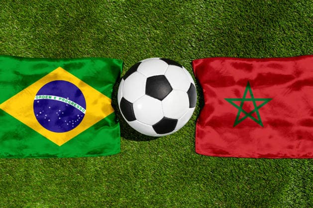 May 22, 2026: PHOTO MONTAGE, 2026 FIFA World Cup, WM, Weltmeisterschaft, Fussball National flags of Brazil and Morocco with a soccer ball on the field. Illustrative image for the group stage match on June 14 at the 2026 FIFA World Cup *** FOTOMONTAGE, Fußball-Weltmeisterschaft 2026: Nationalflaggen von Brasilien und Marokko mit Fußball auf Rasen. Symbolbild zum WM-Gruppenspiel am 14 Juni bei der FIFA Fussball-Weltmeisterschaft 2026