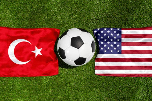 May 22, 2026: PHOTO MONTAGE, 2026 FIFA World Cup, WM, Weltmeisterschaft, Fussball National flags of Turkey and the U.S. with a soccer ball on the field. Stock image for the group stage match on June 26 at the 2026 FIFA World Cup *** FOTOMONTAGE, Fußball-Weltmeisterschaft 2026: Nationalflaggen von Türkei und USA mit Fußball auf Rasen. Symbolbild zum WM-Gruppenspiel am 26 Juni bei der FIFA Fussball-Weltmeisterschaft 2026