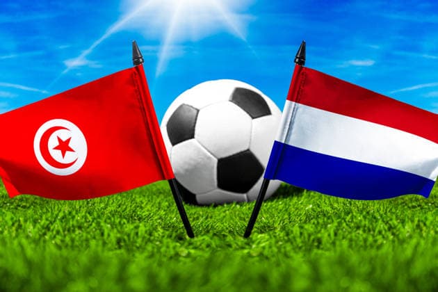 May 22, 2026: PHOTO MONTAGE, 2026 FIFA World Cup, WM, Weltmeisterschaft, Fussball National flags of Tunisia and the Netherlands with a soccer ball on the field. Stock image for the group stage match on June 26 at the 2026 FIFA World Cup *** FOTOMONTAGE, Fußball-Weltmeisterschaft 2026: Nationalflaggen von Tunesien und Niederlande mit Fußball auf Rasen. Symbolbild zum WM-Gruppenspiel am 26 Juni bei der FIFA Fussball-Weltmeisterschaft 2026