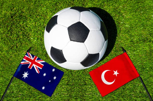May 22, 2026: PHOTO MONTAGE, 2026 FIFA World Cup, WM, Weltmeisterschaft, Fussball National flags of Australia and Turkey with a soccer ball on the field. Stock image for the group stage match on June 14 at the 2026 FIFA World Cup *** FOTOMONTAGE, Fußball-Weltmeisterschaft 2026: Nationalflaggen von Australien und Türkei mit Fußball auf Rasen. Symbolbild zum WM-Gruppenspiel am 14 Juni bei der FIFA Fussball-Weltmeisterschaft 2026