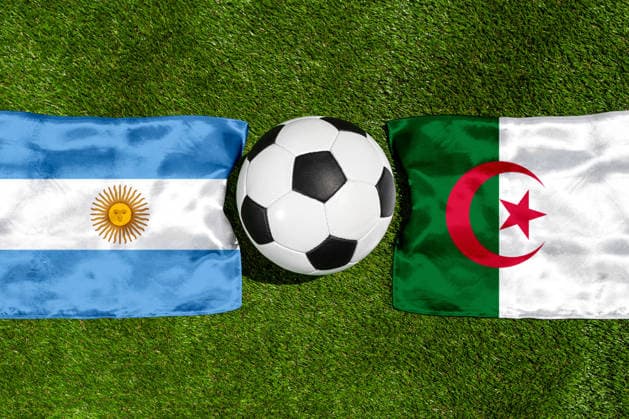 May 22, 2026: PHOTO MONTAGE, 2026 FIFA World Cup, WM, Weltmeisterschaft, Fussball National flags of Argentina and Algeria with a soccer ball on the field. Stock image for the group stage match on June 17 at the 2026 FIFA World Cup *** FOTOMONTAGE, Fußball-Weltmeisterschaft 2026: Nationalflaggen von Argentinien und Algerien mit Fußball auf Rasen. Symbolbild zum WM-Gruppenspiel am 17 Juni bei der FIFA Fussball-Weltmeisterschaft 2026