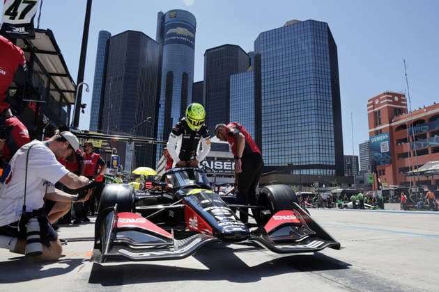 Mike Schumacher GER gets into his Honda 47 in front of the imposing GM main building, 1 free practice, Team Rahal Letterman Lanigan Racing, Detroit, Michigan, USA, 29 05 2026, Indycar Series, photographed by his content creator left