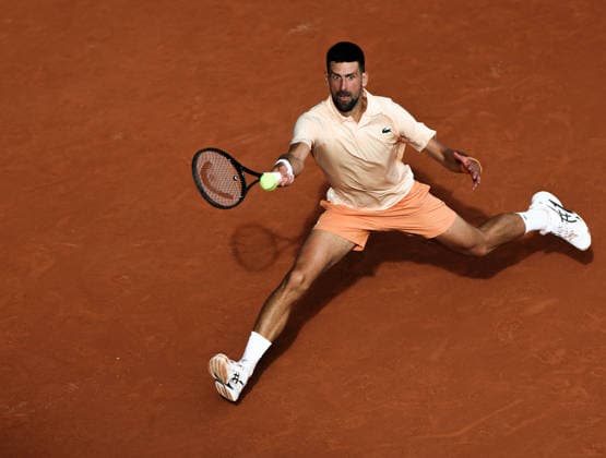 (260530) -- PARIS, May 30, 2026 -- Novak Djokovic hits a return during the men s singles third round match between Novak Djokovic of Serbia and Joao Fonseca of Brazil at the French Open tennis tournament at Roland Garros, Paris, France, May 29, 2026. ) (SP)FRANCE-PARIS-TENNIS-FRENCH OPEN-MEN S SINGLES WuxHuiwo 