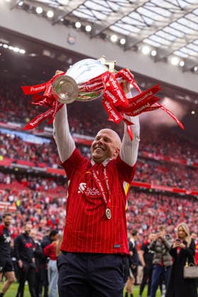 (SP) BRITAIN-LIVERPOOL-FOOTBALL-FA PREMIER LEAGUE-LIVERPOOL FC v CRYSTAL PALACE FC (250525) -- LIVERPOOL, May 25, 2025 (Xinhua) -- Liverpool s head coach Arne Slot with the Premier League trophy, as the Reds are crowned Champions for a 20th time, after the FA Premier League match between Liverpool FC and Crystal Palace FC at Anfield in Liverpool, Britain, on May 25, 2025. The game ended in a 1-1 draw.. (Xinhua) FOR EDITORIAL USE ONLY. NOT FOR SALE FOR MARKETING OR ADVERTISING CAMPAIGNS. NO USE WITH UNAUTHORIZED AUDIO, VIDEO, DATA, FIXTURE LISTS, CLUB LEAGUE LOGOS OR LIVE SERVICES. ONLINE IN-MATCH USE LIMITED TO 45 IMAGES, NO VIDEO EMULATION. NO USE IN BETTING, GAMES OR SINGLE CLUB LEAGUE PLAYER PUBLICATIONS.  Copyright: xXinhuax 2025-05-25-775-Liverpool_Crystal_Palace