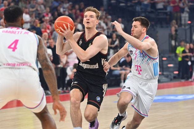Justus HOLLATZ FCB , action,duel against Grayson MURPHY Bonn Basketball BBL,season 2025 2026 ,1 play off semi final FC Bayern Muenchen Telekom Baskets Bonn on 30 05 2025, S A P G A R D EN