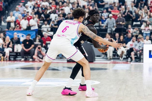 MUNICH, GERMANY - MAY 30: Wenyen Gabriel (FC Bayern Muenchen, 32) controls the ball against Michael Kessens (Telekom Baskets Bonn, 6) during the easyCredit Basketball Bundesliga Playoffs Semi-final match 1 between FC Bayern Muenchen vs. Telekom Baskets Bonn at SAP Garden on match 1 of easyCredit Basketball Bundesliga Playoffs Semi-final on May 30, 2026 in Munich, Germany. Bavaria Germany Copyright: xSteffiexWunderlx