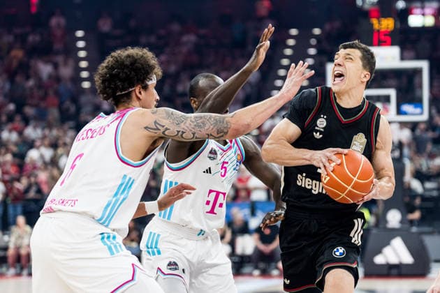 MUNICH, GERMANY - MAY 30: Vladimir Lucic (FC Bayern Muenchen, 11) controls the ball against Michael Kessens (Telekom Baskets Bonn, 6) and Tylan Birts (Telekom Baskets Bonn, 5) during the easyCredit Basketball Bundesliga Playoffs Semi-final match 1 between FC Bayern Muenchen vs. Telekom Baskets Bonn at SAP Garden on match 1 of easyCredit Basketball Bundesliga Playoffs Semi-final on May 30, 2026 in Munich, Germany. Bavaria Germany Copyright: xSteffiexWunderlx