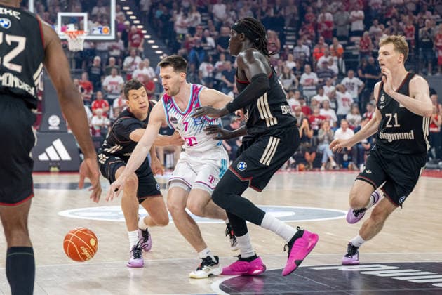 Vladimir Lucic 11 FC Bayern Basketball in duel with Grayson Murphy 7 Telekom Baskets Bonn , Wenyen Gabriel 32 FC Bayern Basketball , FC Bayern Basketball vs Telekom Baskets Bonn, BBL, Semifinal 1, 30 05 2026 Muenchen Bayern Germany Copyright: xkolbert-press UlrichxGamelx