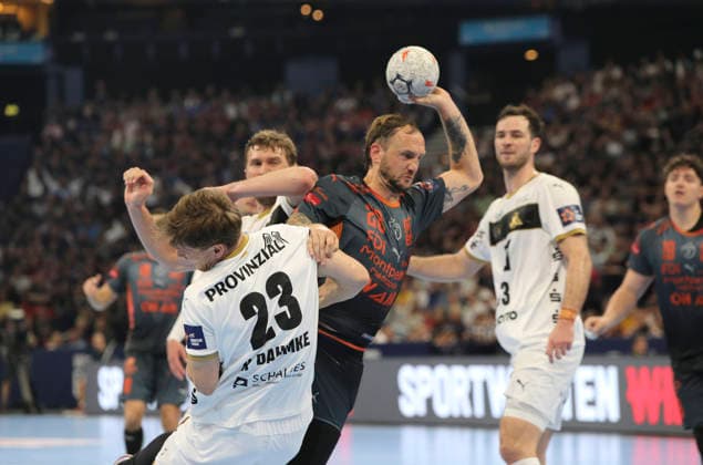 photo Goal throw of Valentin PORTE Montpellier against Magnus Landin Kiel and left Rune Dahmke Kiel Handball Men on Sat 30 05 2026 Mens EHF European League , Final Four in Hamburg THW Kiel Montpellier , Semifinal
