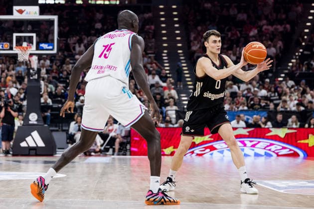 MUNICH, GERMANY - MAY 30: Neno Dimitrijevic (FC Bayern Muenchen, 0) controls the ball against Kur Jongkuch (Telekom Baskets Bonn, 15) during the easyCredit Basketball Bundesliga Playoffs Semi-final match 1 between FC Bayern Muenchen vs. Telekom Baskets Bonn at SAP Garden on match 1 of easyCredit Basketball Bundesliga Playoffs Semi-final on May 30, 2026 in Munich, Germany. Bavaria Germany Copyright: xSteffiexWunderlx