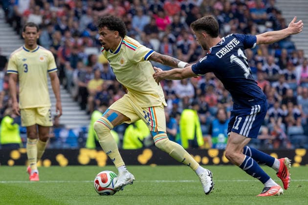 Scotland v Curacao, Friendly International Challenge Jeremy Antonisse of Curacao gets away from Ryan Christie of Scotland national team, Nationalteam during the International Challenge Match - Scotland vs Curacao, Barclays Hampden, Glasgow. 30 May 2026 Hampden Park Barclays Hampden Glasgow Scotland Editorial use only , Copyright: xColinxPoultneyx PSI-24309-0148