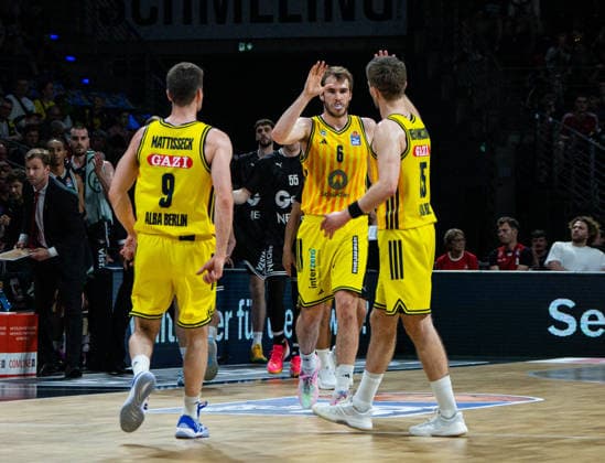 Malte Delow Alba Berlin, 6 cheers with Sam Griesel Alba Berlin, 5 and Jonas Mattisseck Alba Berlin, 9 30 05 2026, Alba Berlin vs Bamberg Baskets, Basketball, BBL, Max Schmeling Halle, Berlin DFL regulations prohibit any use of photographs as image sequences and or quasi video Copyright: HMBxMedia xFinnxWeidmann