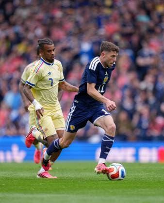 Ryan Christie of Scotland chased by Juninho Bacuna of Curacao Scotland v Curacao, International Friendly, Länderspiel, Nationalmannschaft Football, Hampden Park, Glasgow, Scotland, UK - 30 May 2026Glasgow Hampden Park United Kingdom EDITORIAL USE ONLY No use with unauthorised audio, video, data, fixture lists, club league logos or live services. Online in-match use limited to 120 images, no video emulation. No use in betting, games or single club league player publications. Copyright: xStuartxWallace Shutterstockx 16898283aj