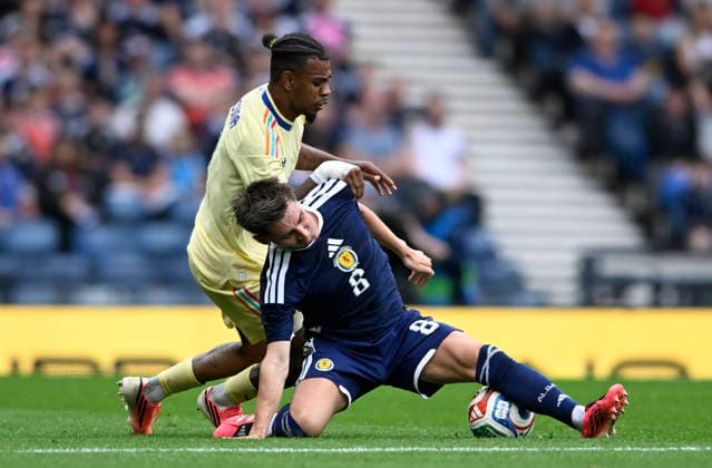 Glasgow, Scotland, 30th May 2026. Juninho Bacuna of Curacao and Billy Gilmour of Scotland during the Scotland vs Curacao International Friendly, Länderspiel, Nationalmannschaft match at Hampden Park, Glasgow. Picture credit should read: Neil Hanna Sportimage EDITORIAL USE ONLY. No use with unauthorised audio, video, data, fixture lists, club league logos or live services. Online in-match use limited to 120 images, no video emulation. No use in betting, games or single club league player publications. SPI_083_NH_Scotland_Curacao SPI-4830-0083