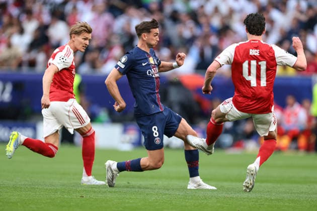Budapest, Hungary, 30th May 2026. Declan Rice of Arsenal FC challenges Fabian Ruiz of PSG as Martin Odegaard of Arsenal FC looks on during the Paris Saint Germain vs Arsenal FC UEFA Champions League Final match at Puskas Arena, Budapest. Picture credit should read: Jonathan Moscrop Sportimage EDITORIAL USE ONLY. No use with unauthorised audio, video, data, fixture lists, club league logos or live services. Online in-match use limited to 120 images, no video emulation. No use in betting, games or single club league player publications. SPI_004_PSG_ARSENAL_UCL SPI-4825-0004
