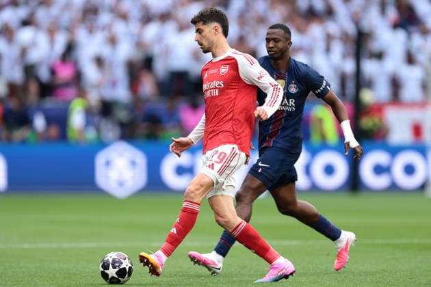 Budapest, Hungary, 30th May 2026. Kai Havertz of Arsenal FC is pursued by Willian Pacho of PSG during the Paris Saint Germain vs Arsenal FC UEFA Champions League Final match at Puskas Arena, Budapest. Picture credit should read: Jonathan Moscrop Sportimage EDITORIAL USE ONLY. No use with unauthorised audio, video, data, fixture lists, club league logos or live services. Online in-match use limited to 120 images, no video emulation. No use in betting, games or single club league player publications. SPI_008_PSG_ARSENAL_UCL SPI-4825-0008