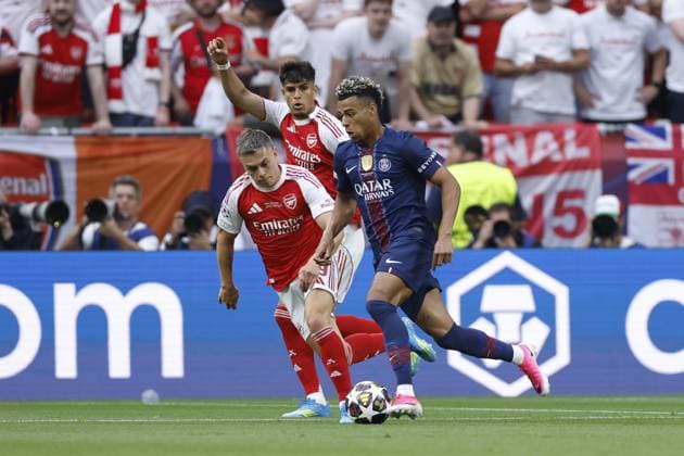 BUDAPEST - Myles Lewis-Skelly of Arsenal FC and Desire Doue of Paris Saint-Germain during the UEFA Champions League Final between Paris Saint-Germain and Arsenal FC at Puskas ArÃ na on May 30, 2026, Budapest, Hungary. MAURICE VAN STEEN ANP UEFA Champions League Final 2026 2025-2026 xVIxANPxSportx xMauricexvanxSteenxIVx 559680835 originalFilename: 559680835.jpg