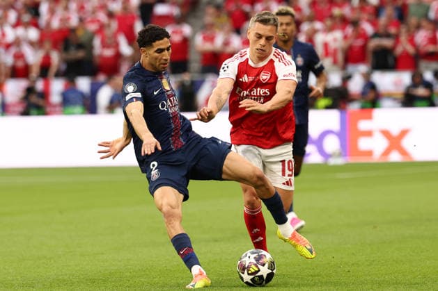Achraf Hakimi of PSG and Leonardo Trossard of Arsenal compete for the ball during the 2025 2026 Champions League Final football match between Paris Saint Germain and Arsenal FC at Puskas Arena stadium in Budapest (Hungary), May 30th, 2026. CesarexPurini