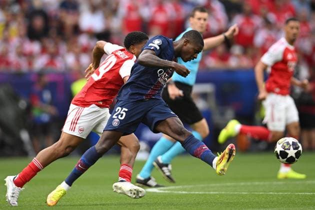 Hungary Soccer Champions League PSG - Arsenal 9176939 30.05.2026 Arsenal s Myles Lewis-Skelly and Paris Saint-Germain s Nuno Mendes struggle for the ball during the UEFA Champions League final soccer match between Paris Saint-Germain (PSG) and Arsenal at Puskas Arena in Budapest, Hungary. Alexey Filippov Sputnik Budapest Hungary  Copyright: xAlexeyxFilippovx
