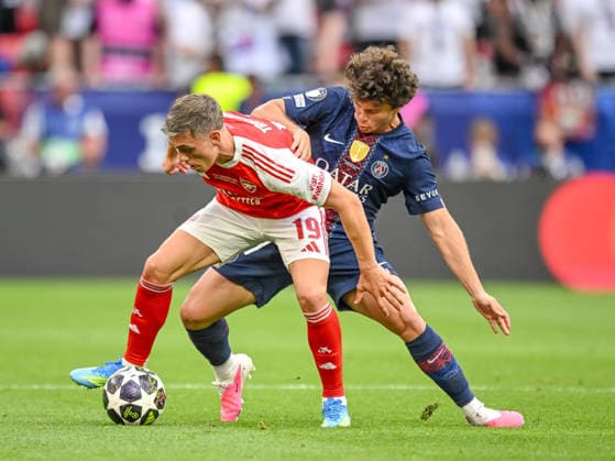 Leandro Trossard Arsenal FC and Joao Neves Paris Saint Germain FC battle for the ball during the UEFA Champions League Final 2026 match between Paris Saint Germain and Arsenal FC at Puskas Arena on May 30, 2026 in Budapest, Hungary Photo by Harry Langer DeFodi Images