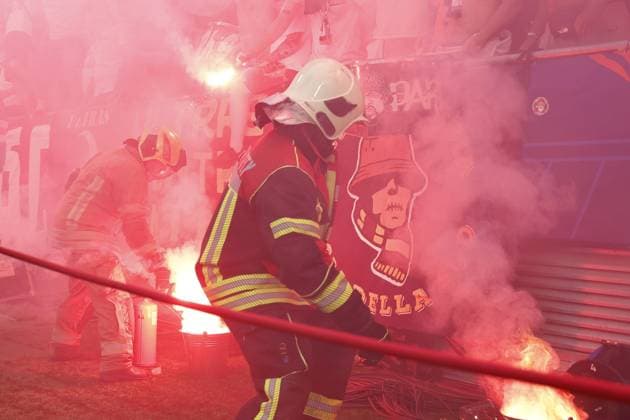 BUDAPEST - Firefighters deal with flares during the UEFA Champions League final between Paris Saint-Germain and Arsenal FC at the Puskas Arena on 30 May 2026, Budapest, Hungary. MAURICE VAN STEEN ANP UEFA Champions League Final 2026 2025-2026 xVIxANPxSportx xMauricexvanxSteenxIVx 559687706 originalFilename: 559687706.jpg