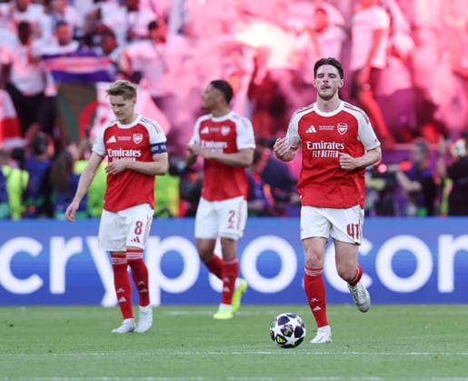 Budapest, Hungary, 30th May 2026. Dejected Martin Odegaard of Arsenal and Declan Rice of Arsenal following the equalising goal by PSG during the Paris Saint Germain vs Arsenal UEFA Champions League Final match at Puskas Arena, Budapest. Picture credit should read: David Klein Sportimage EDITORIAL USE ONLY. No use with unauthorised audio, video, data, fixture lists, club league logos or live services. Online in-match use limited to 120 images, no video emulation. No use in betting, games or single club league player publications. SPI_109_DK_PSG_Arsenal SPI-4828-0111
