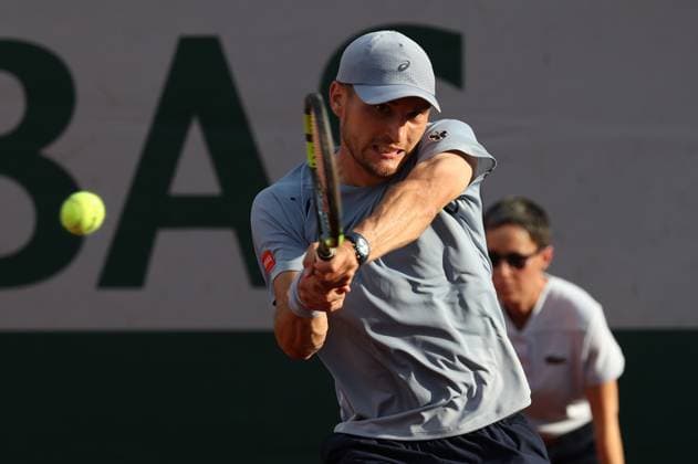 Belgian Raphael Collignon pictured in action, a two-handed backhand at a third round match between Italian Arnaldi and Belgian Collignon, in the men s singles at the Roland Garros French Open tennis tournament, in Paris, France, Saturday 30 May 2026. This year s tournament takes place from 18 May to 07 June. VIRGINIExLEFOUR  x175483964x