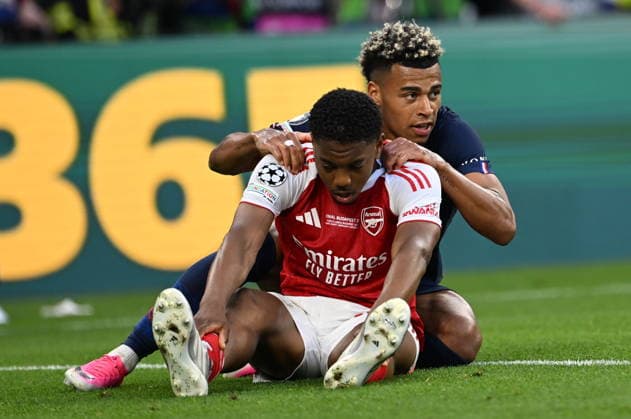 Paris Saint-Germain v Arsenal - UEFA Champions League final BUDAPEST, HUNGARY - MAY 30: Desire Doue (back) of Paris Saint-Germain in action against Myles Lewis-Skelly (front) of Arsenal during the UEFA Champions League final match between Paris Saint-Germain (PSG) and Arsenal at Puskas Arena in Budapest, Hungary, on May 30, 2026. Halil Sagirkaya Anadolu Budapest Hungary. Editorial use only. Please get in touch for any other usage.  Copyright: x2026xAnadoluxHalilxSagirkayax