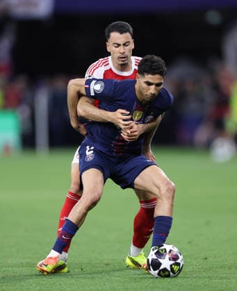 Budapest, Hungary, 30th May 2026. Gabriel Martinelli of Arsenal gets to grips with Achraf Hakimi of Paris Saint-Germain during the Paris Saint Germain vs Arsenal UEFA Champions League Final match at Puskas Arena, Budapest. Picture credit should read: David Klein Sportimage EDITORIAL USE ONLY. No use with unauthorised audio, video, data, fixture lists, club league logos or live services. Online in-match use limited to 120 images, no video emulation. No use in betting, games or single club league player publications. SPI_136_DK_PSG_Arsenal SPI-4828-0135