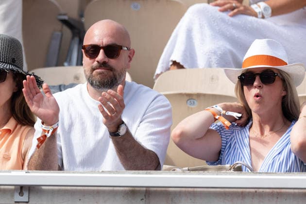 2026 French Open - Celebrities In Stand Day 7 NB Kyan Khojandi, Christine Giua in stand day 7 during the 2026 French Open at Roland Garros on May 30, 2026 in Paris, France. Photo by Nasser Berzane ABACAPRESS.COM  Copyright: xBerzanexNasser ABACAx
