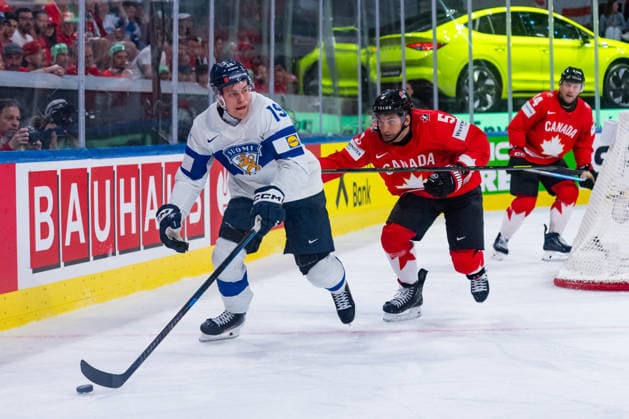 ZURICH, SWITZERLAND - MAY 30: Denton Mateychuk (Canada, 5) in the battle for the puck with Waltteri Maralae (Finland, 19) during the Half Finals - Match 62 between Canada and Finland at the IIHF Ice hockey, Eishockey World Championship, WM, Weltmeisterschaft 2026, Swiss Life Arena on May 30, 2026 in Zurich, Switzerland. Zurich Switzerland Copyright: xTimoxSteinx
