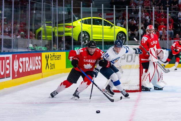ZURICH, SWITZERLAND - MAY 30: Patrik Puistola (Finland, 21) in the battle for the puck with Morgan Rielly (Canada, 44) during the Half Finals - Match 62 between Canada and Finland at the IIHF Ice hockey, Eishockey World Championship, WM, Weltmeisterschaft 2026, Swiss Life Arena on May 30, 2026 in Zurich, Switzerland. Zurich Switzerland Copyright: xTimoxSteinx