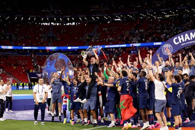 Luis Enrique head coach of Paris Saint-Germain celebrates with the trophy after winning the UEFA Champions League Paris Saint-Germain v Arsenal, UEFA Champions League, Final, Football, Puskas Arena, Budapest, Hungary - 30 May 2026Budapest Puskas Arena Hungary EDITORIAL USE ONLY No use with unauthorised audio, video, data, fixture lists, club league logos or live services. Online in-match use limited to 120 images, no video emulation. No use in betting, games or single club league player publications. Copyright: xAhmadxMora Shutterstockx 16902827ev