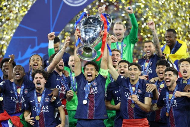 Paris Saint-Germain v Arsenal FC - UEFA Champions League Final 2026 Marquinhos of Paris Saint-Germain and team-mates celebrate with the European Cup TROPHY after winning the UEFA Champions League Final 2026 match between Paris Saint-Germain and Arsenal FC at Puskas Arena on May 30, 2026 in Budapest, Hungary. WARNING! This Photograph May Only Be Used For Newspaper And Or Magazine Editorial Purposes. May Not Be Used For Publications Involving 1 player, 1 Club Or 1 Competition Without Written Authorisation From Football DataCo Ltd. For Any Queries, Please Contact Football DataCo Ltd on +44 (0) 207 864 9121 Budapest Puskas Arena Hungary Hungary Copyright: xAllstarxPicturexLibraryxLtdx
