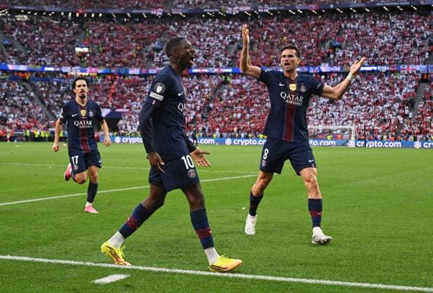 Hungary Soccer Champions League PSG - Arsenal 9177283 30.05.2026 Paris Saint-Germain s Ousmane Dembele celebrates with teammates Vitinha and Fabian Ruiz after scoring his team s first goal from the penalty spot during the UEFA Champions League final soccer match between Paris Saint-Germain (PSG) and Arsenal at Puskas Arena in Budapest, Hungary. Alexey Filippov Sputnik Budapest Hungary  Copyright: xAlexeyxFilippovx