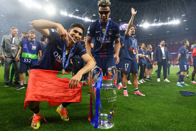 May 30, 2026, Budapest, Hungary: ACHRAF HAKIMI and DESIRE DOUE of PSG pose with the trophy after winning in the UEFA Champions League 2025 26 against Arsenal FC at the Puskas Arena in Budapest, Hungary. PSG won 4:3 on penalties after a 1:1 game. Soccer 2026: UEFA Champions League Final: PSG : Arsenal  - ZUMAc179 20260530_zep_c179_053 Copyright: xMickaelxChavetx