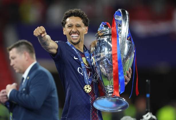 UEFA Champions League Final 2026 - Paris Saint Germain v Arsenal BUDAPEST, HUNGARY, MAY 30: Marquinhos of Paris Saint-Germain punches the air in delight whilst holding the UEFA Champions League Trophy in celebration after winning the UEFA Champions League Final 2026 during the UEFA Champions League Final 2026 match between Paris Saint Germain v Arsenal at Puskas Arena, Budapest, Hungary, on 30 May. (Photo by Daniel Weir) Budapest Puskas Arena Hungary Copyright: xDanielxWeir SportsxPressxPhotox Sportspressphoto_SPR157605