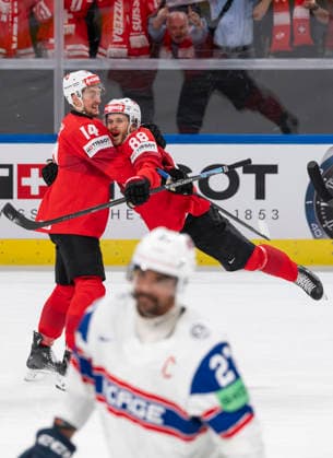 Dean Kukan, re Christoph Bertschy, SUI, cheering at 1 0, vo MARTINSEN Andreas, NOR, Switzerland Norway, semi-final, Ice Hockey World Championship, Zurich 30 05 2026