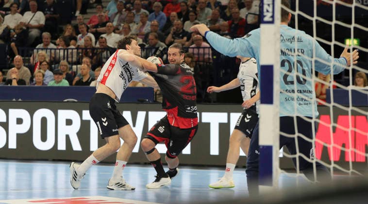 photo on the ball Olle Forsell Schefvert Melsungen vs Niclas Kirkelokke Handball Men on Sat 30 05 2026 Mens EHF European League , Final Four in Hamburg SG Flensburg Melsungen, Semi Final