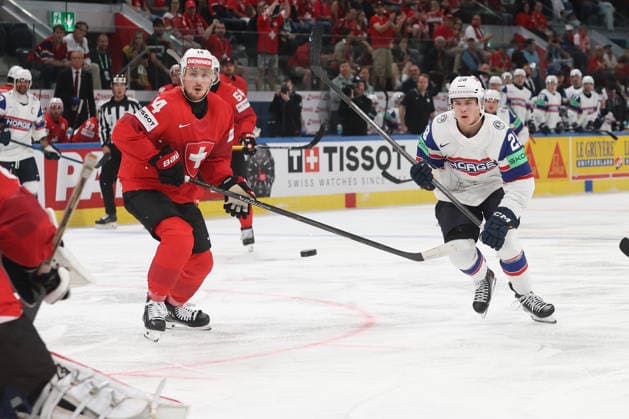 30 05 2026 Swiss Life Arena Zurich , SWITZERLAND, Mens Ice Hockey IIHF World Championship Zurich 2026 Semifinal SUI NOR Dean Kukan SUI vs Michael Brandsegg Nygard NOR