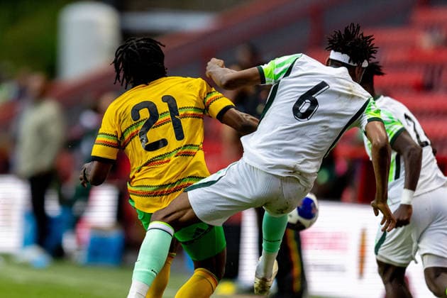 Jamaica v Nigeria, Unity Cup London 2026, Cup Final Jamaica forward Dajaune Brown (21) bundles over Nigeria defender Chibuike Nwaiwu during the Unity Cup London 2026 match between Jamaica and Nigeria at The Valley, London, UK on 30 May 2026. London The Valley Greater London UK Editorial use only , Copyright: xManjitxNarotrax PSI-24353-0023
