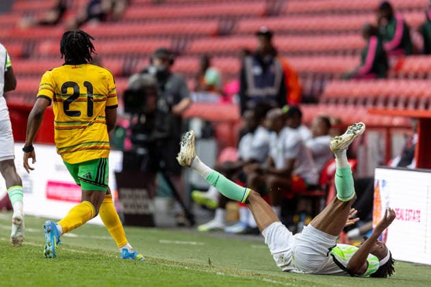 Jamaica v Nigeria, Unity Cup London 2026, Cup Final Jamaica forward Dajaune Brown (21) bundles over Nigeria defender Chibuike Nwaiwu during the Unity Cup London 2026 match between Jamaica and Nigeria at The Valley, London, UK on 30 May 2026. London The Valley Greater London UK Editorial use only , Copyright: xManjitxNarotrax PSI-24353-0025