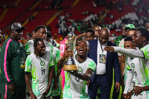 Jamaica v Nigeria, Unity Cup London 2026, Cup Final Nigeria defender Elias Ochobi (13) lifts the Unity Cup Trophy after the Unity Cup London 2026 Final match between Jamaica and Nigeria at The Valley, London, UK on 30 May 2026. London The Valley Greater London UK Editorial use only , Copyright: xToyinxOshodix PSI-24348-0087
