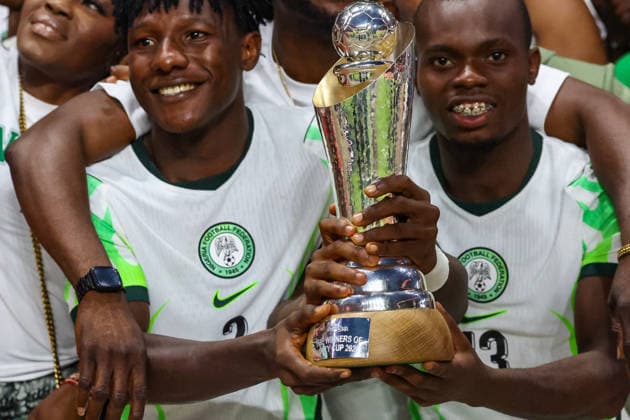 Jamaica v Nigeria, Unity Cup London 2026, Cup Final Nigeria defender Chibueze Oputa (2) and Nigeria defender Elias Ochobi (13) lifts the Unity Cup Trophy in front of the visiting fans after the Unity Cup London 2026 Final match between Jamaica and Nigeria at The Valley, London, UK on 30 May 2026. London The Valley Greater London UK Editorial use only , Copyright: xToyinxOshodix PSI-24348-0094